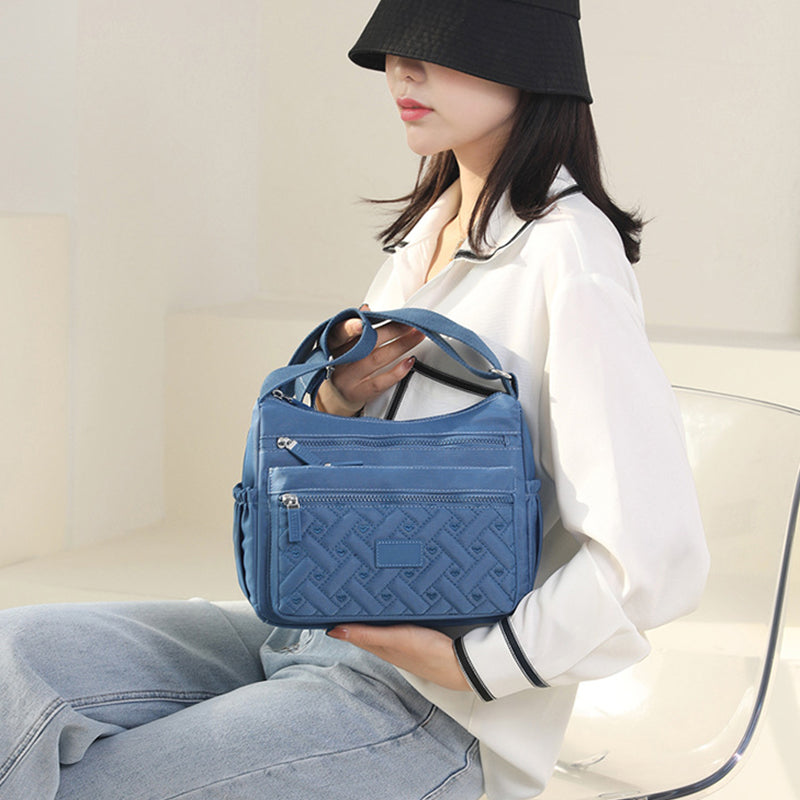 Élégante avec fonctionnalité avec le sac à bandoulière de luxe