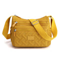Élégante avec fonctionnalité avec le sac à bandoulière de luxe