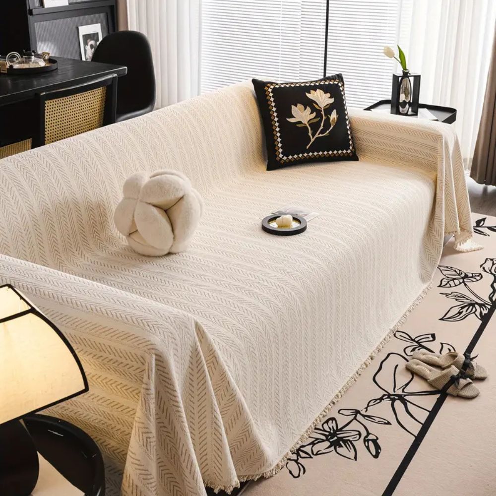 Housse de canapé en chenille à chevrons avec pompons