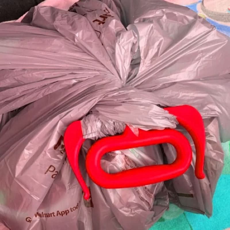 Poignée ultra-pratique pour transporter des sacs lourds sans effort (x2)