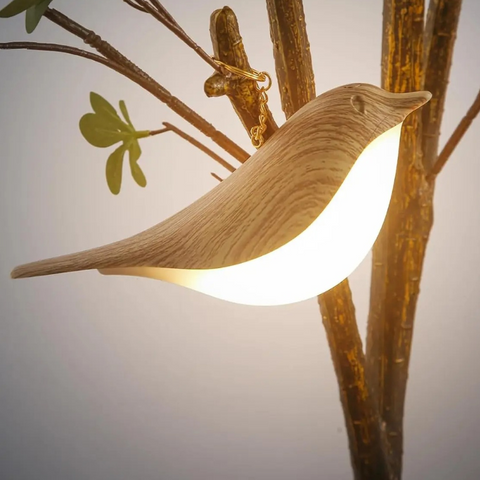 Lampe de table en forme d'oiseau avec un corps rétroéclairé