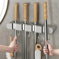 Support mural polyvalent pour outils ménagers