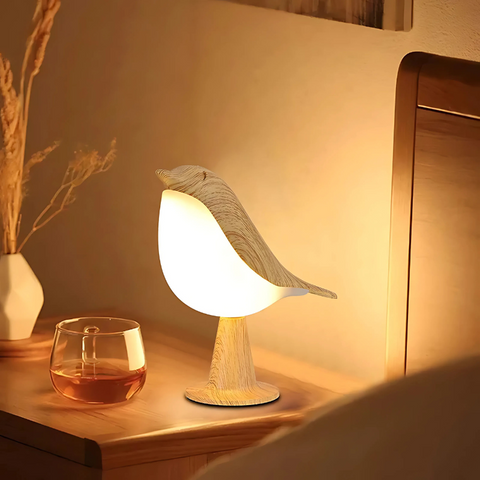 Lampe de table en forme d'oiseau avec un corps rétroéclairé