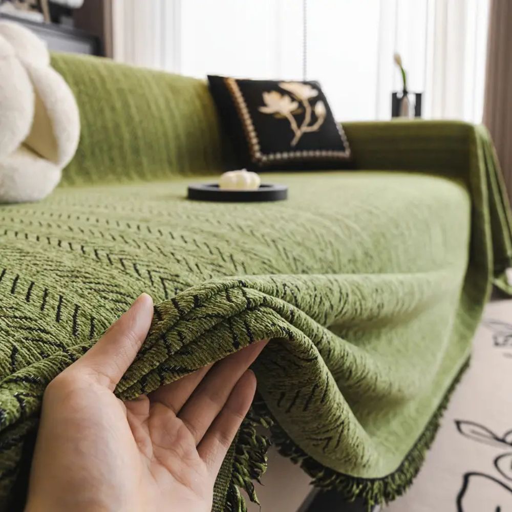 Housse de canapé en chenille à chevrons avec pompons