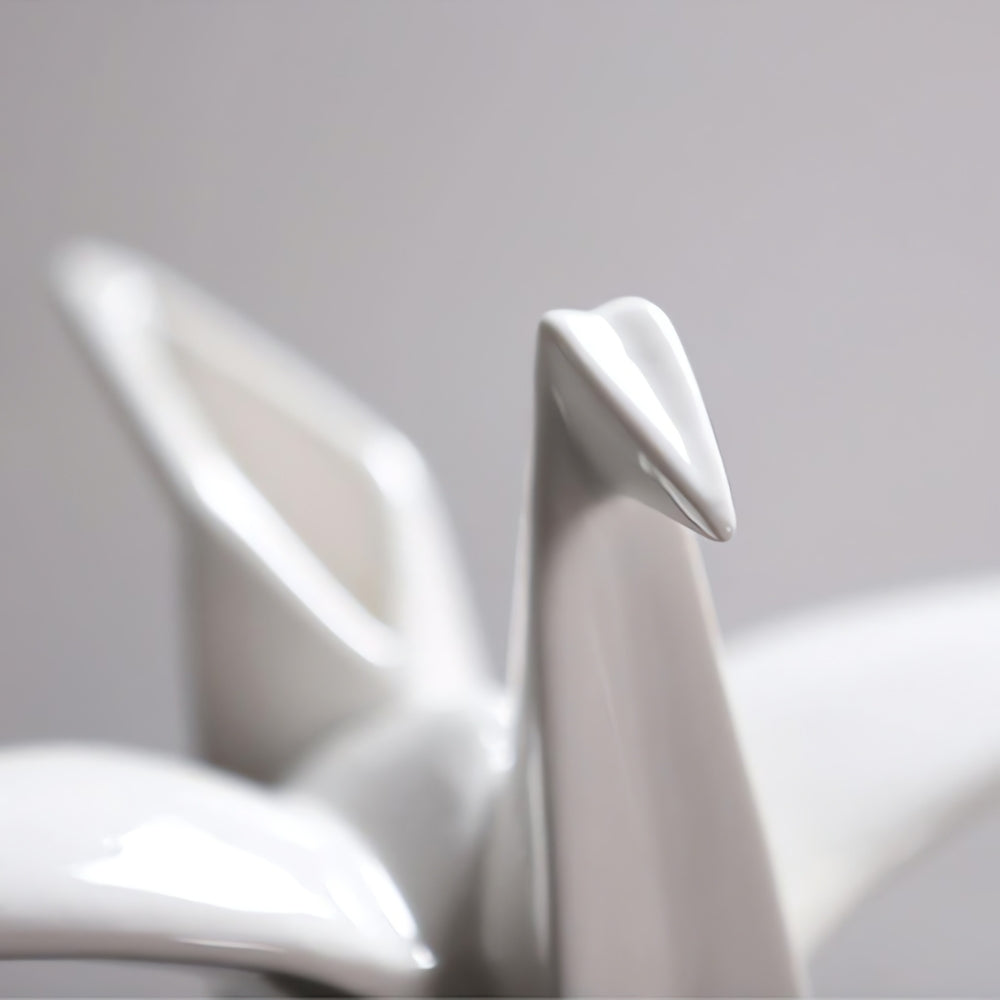 Statue d'oiseau en céramique inspirée de l'origami