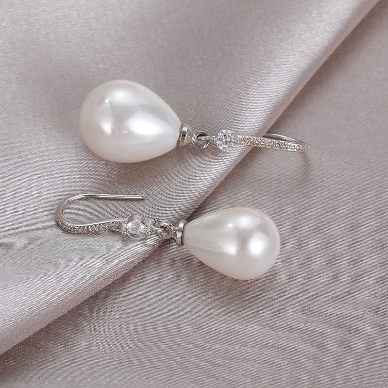 Boucles d'Oreilles en Perles Ovales Blanches