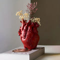 Vase décoratif en céramique avec un motif de cœur vivant