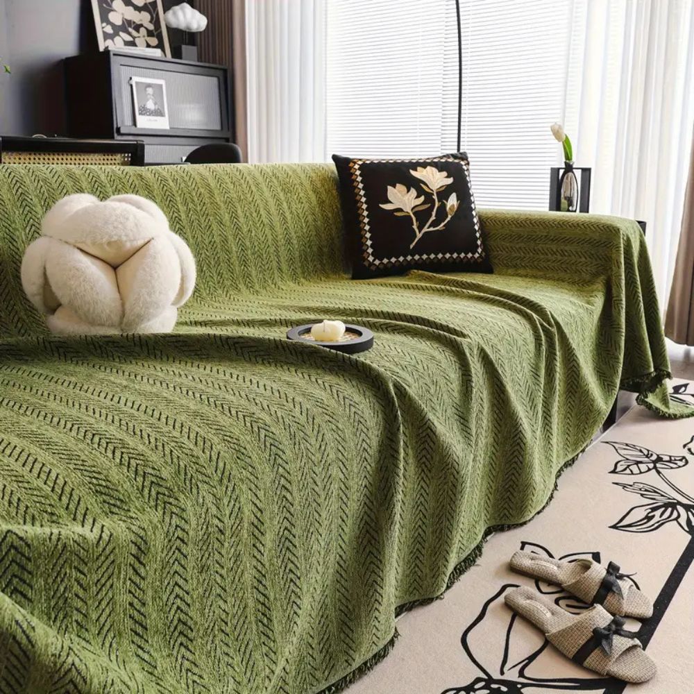 Housse de canapé en chenille à chevrons avec pompons