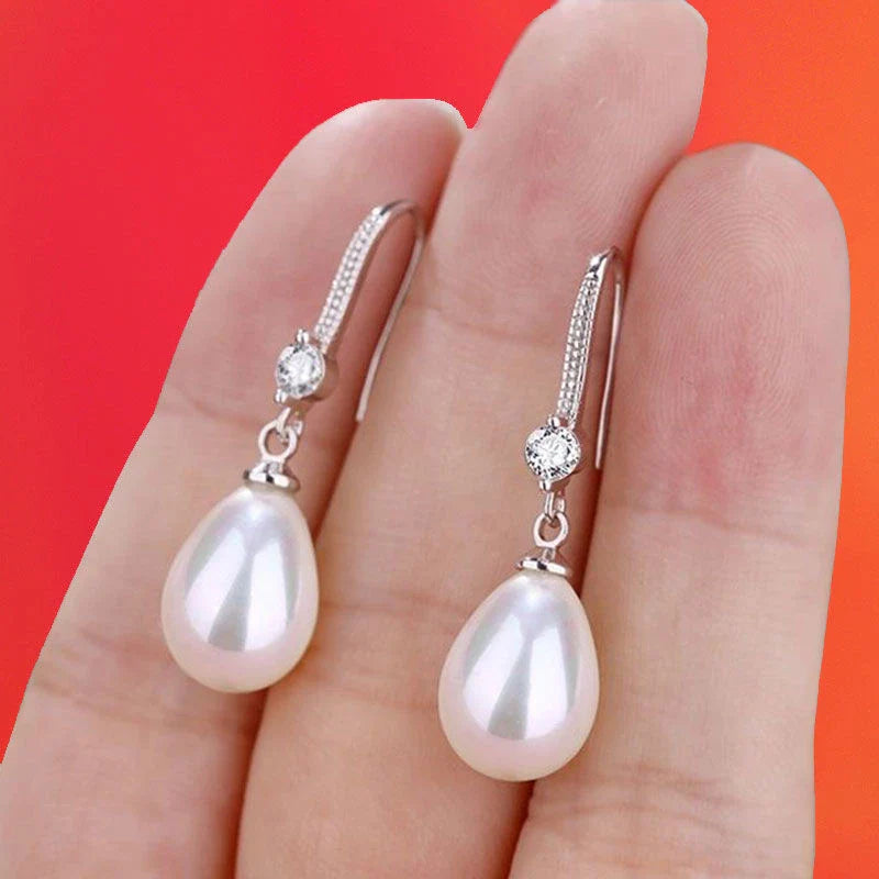 Boucles d'Oreilles en Perles Ovales Blanches