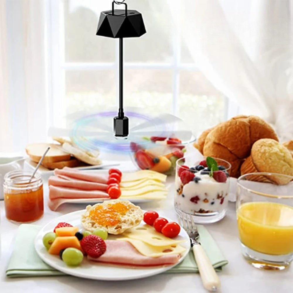 Ventilateur de table repoussant les mouches avec des pales rotatives