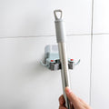 2+2 Gratuits | EasyHold™ - Support mural pour balais et serpillères