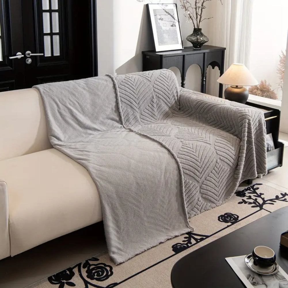 Housse de canapé en polaire avec design à chevrons et feuilles