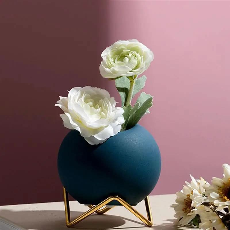 Pot de fleurs en céramique moderne avec support en métal dans des couleurs vives