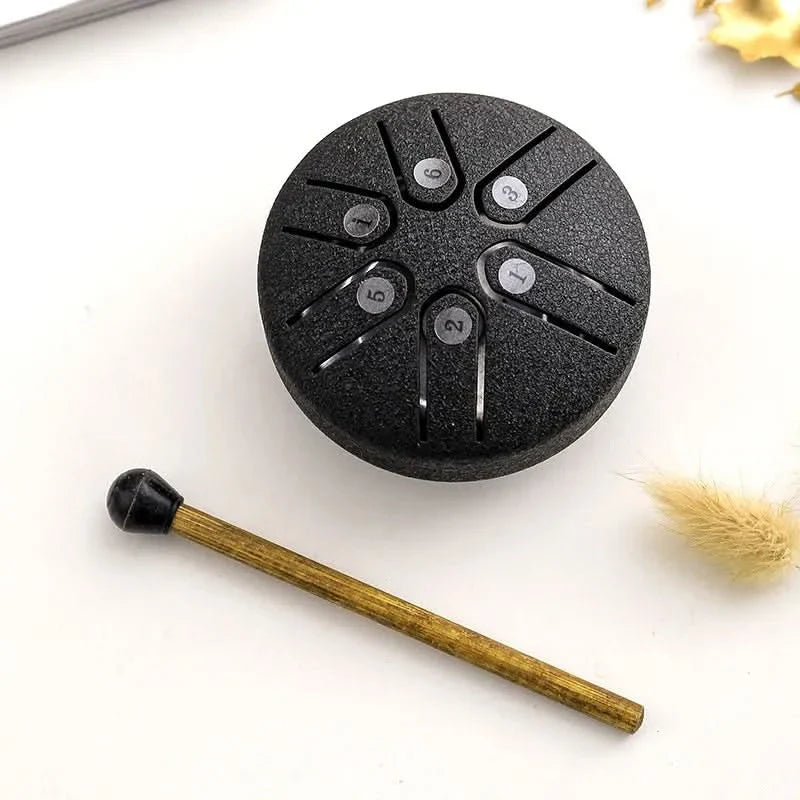 Mini tambour relaxant avec sons apaisants intégrés