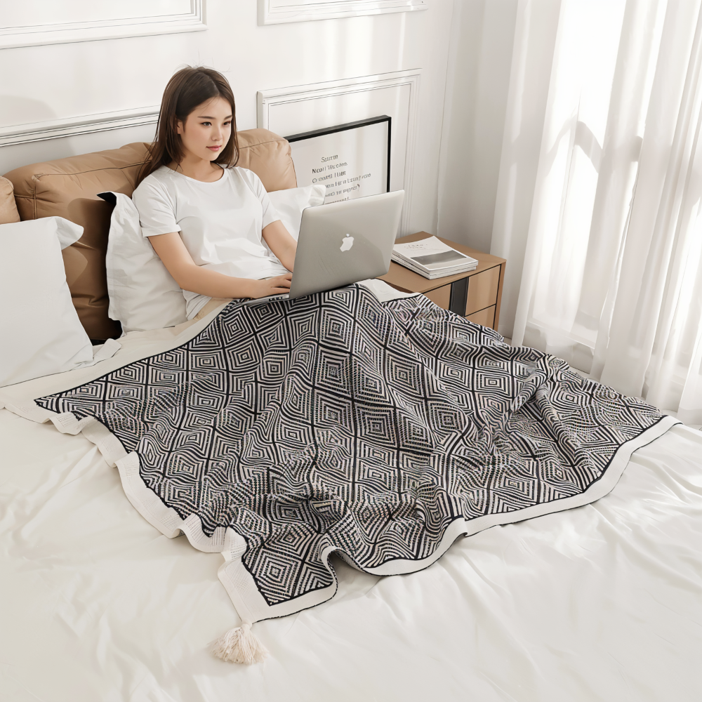 Plaid en polaire géométrique noir et blanc