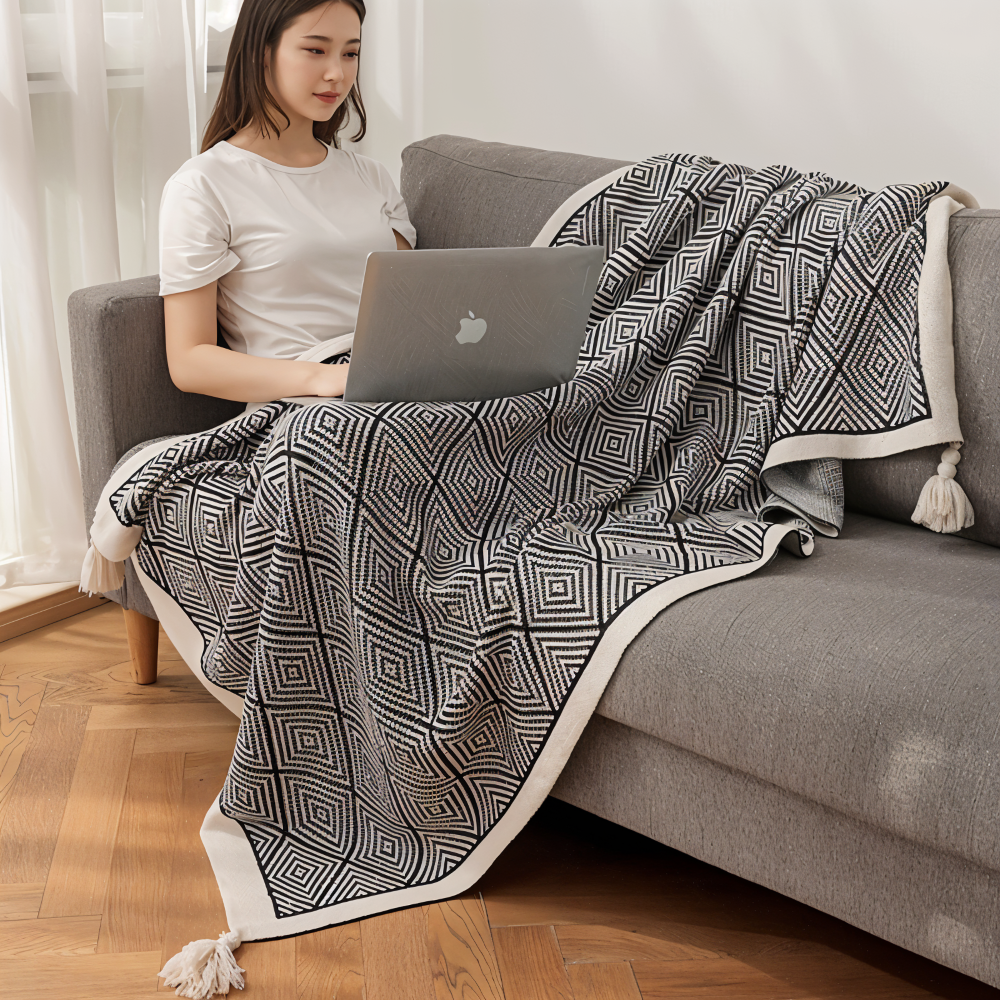 Plaid en polaire géométrique noir et blanc