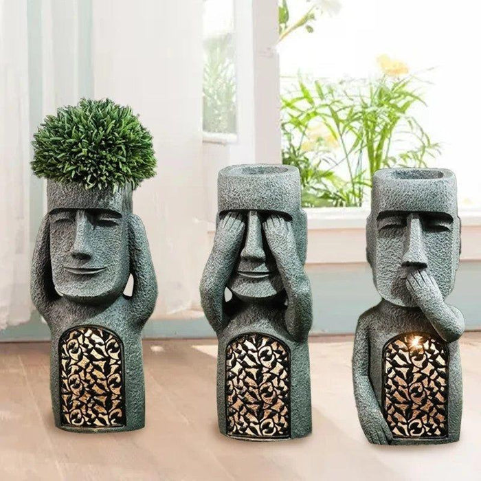 Pot de fleurs GlowPot visage sculpté
