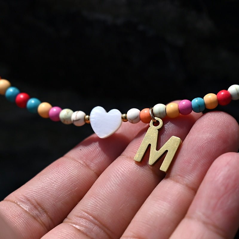 Collier en perles Sandsberg avec pendentif en lettres