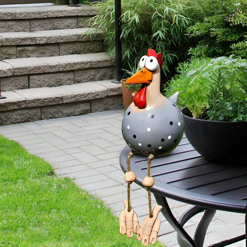 Figurines de jardin coqs avec des jambes pendantes