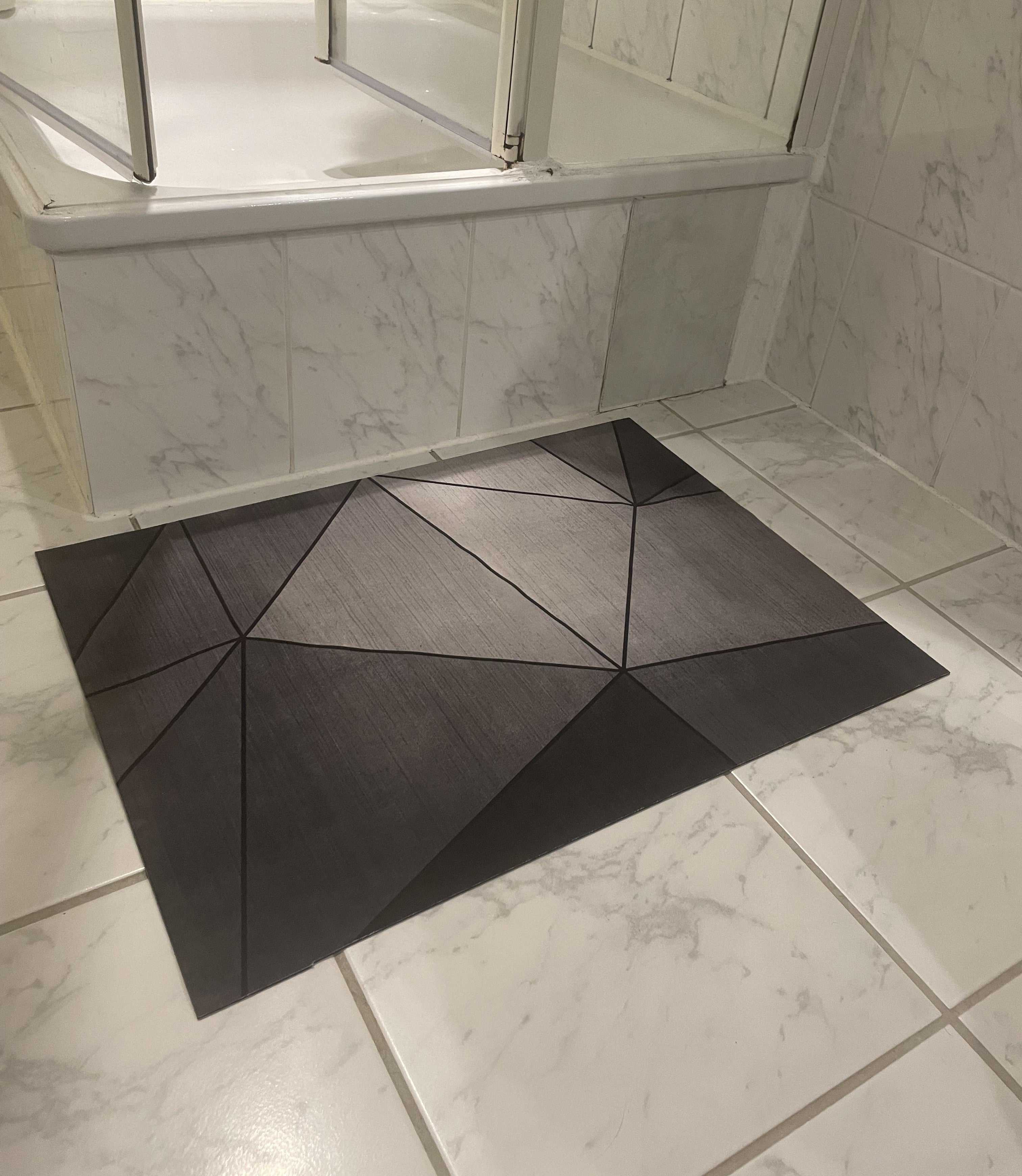 Tapis de Bain DryLux™ – Pour une expérience de salle de bain propre et sèche