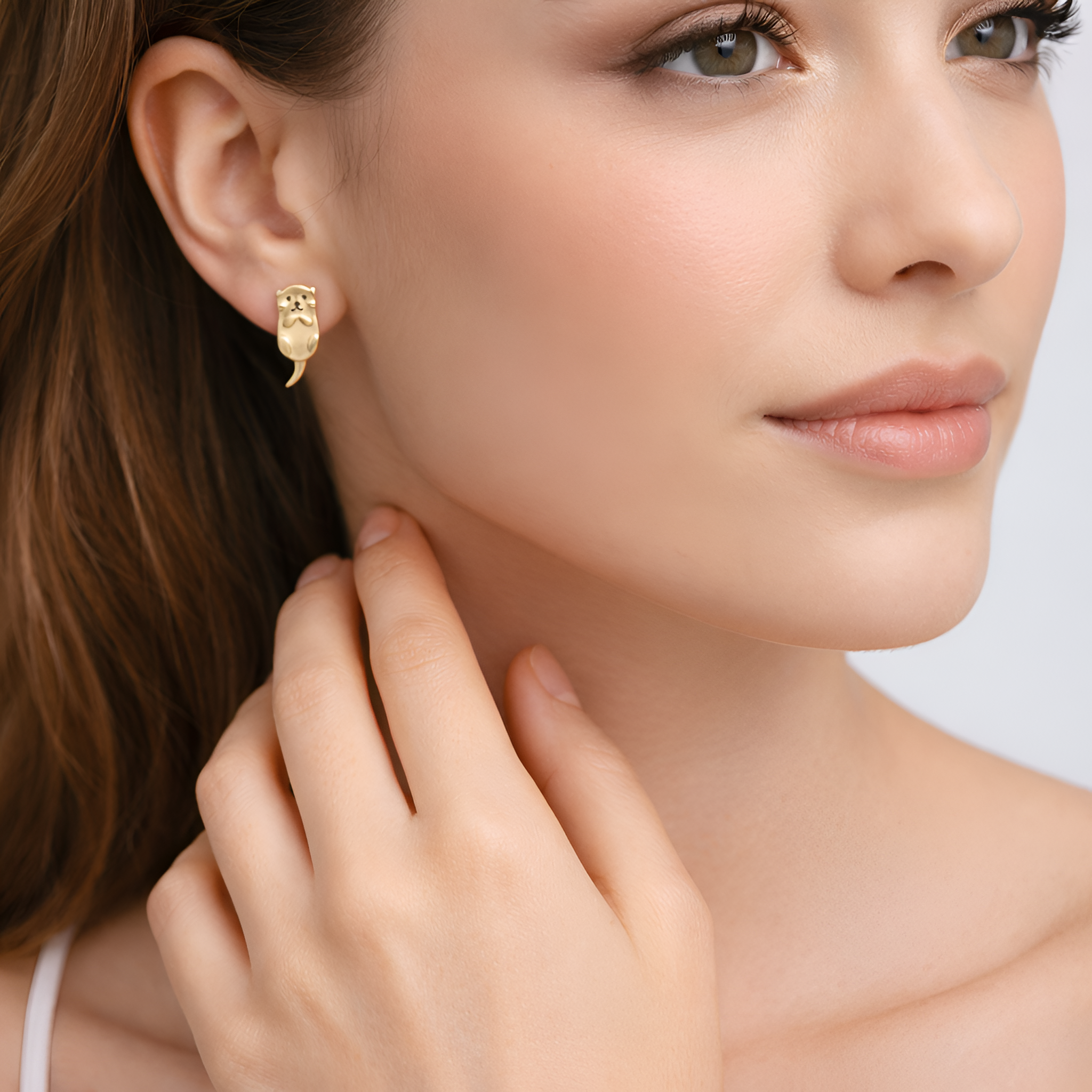 Lyra - Boucles d'oreilles minimalistes en forme de loutre