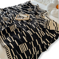 Plaid tricoté en acrylique noir et beige pour canapé et lit