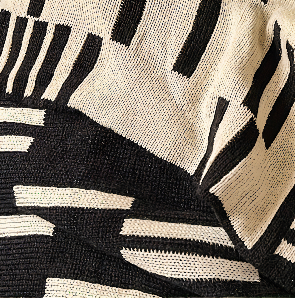 Plaid tricoté en acrylique noir et beige pour canapé et lit