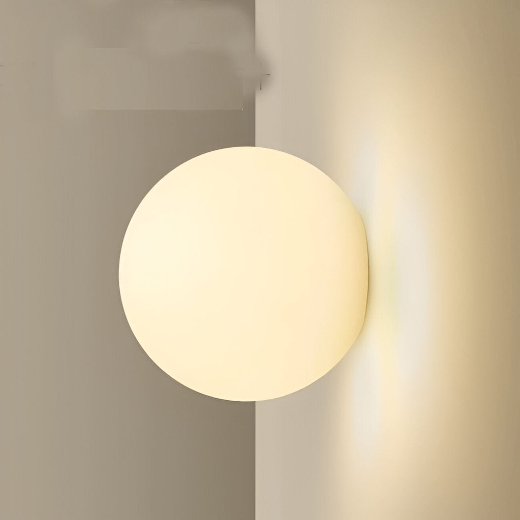 Applique murale à forme ronde plate et lumière diffusée