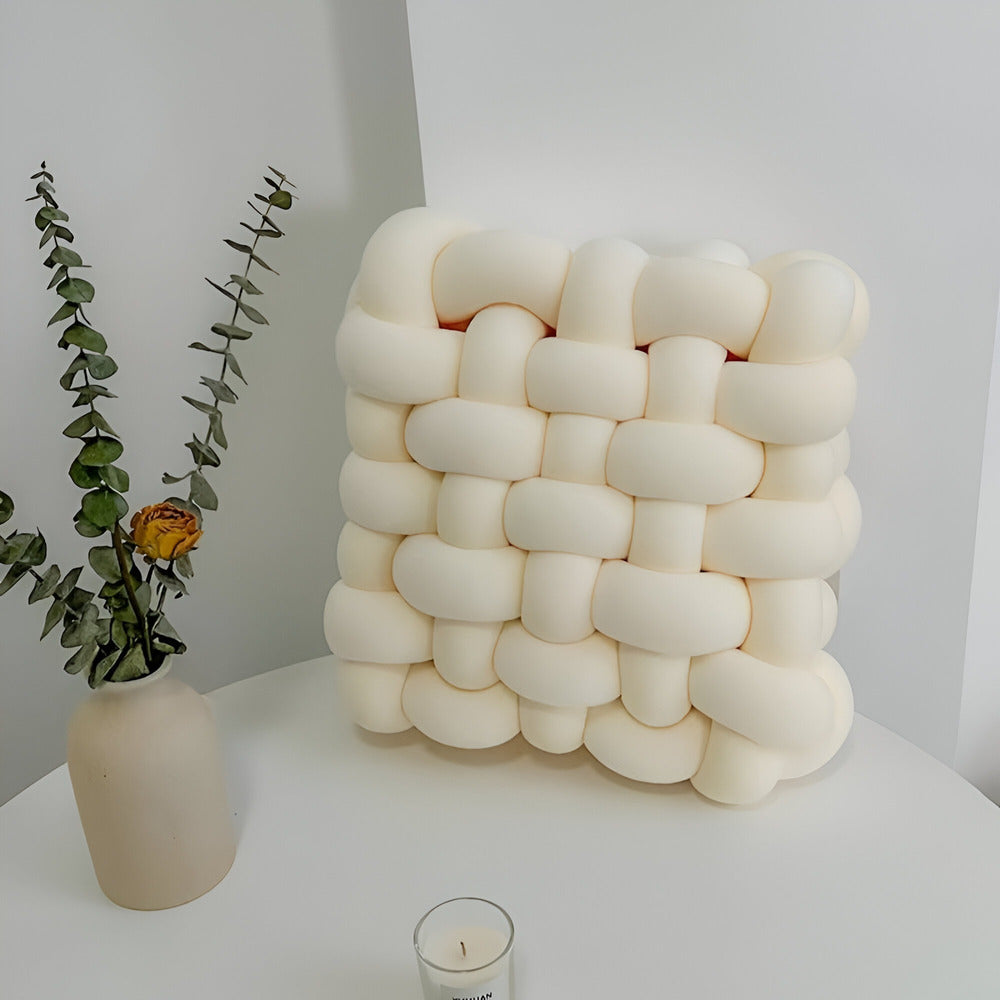 Coussin Super Doux avec Design en Nœud pour un Confort Ultime
