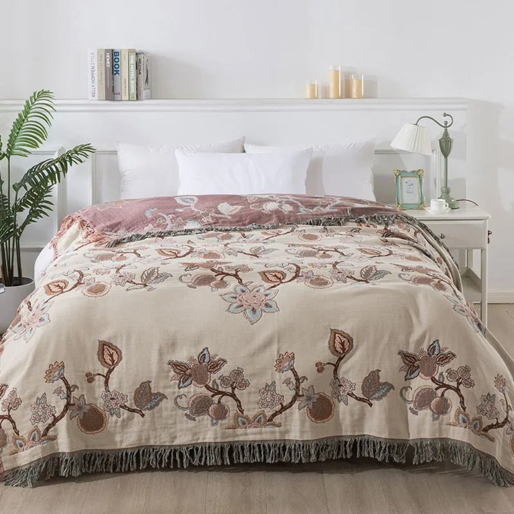 Couverture de lit en coton floral Orchid Trail avec pompons