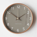 Horloge murale en bois et en verre
