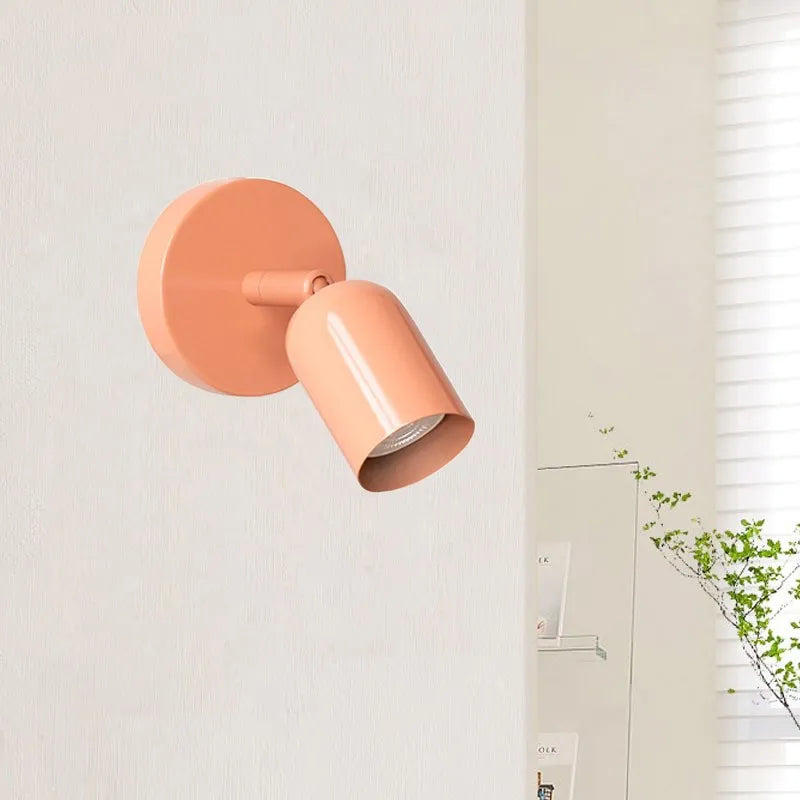 Lampe murale Macaron au design élégant offrant un éclairage d'ambiance