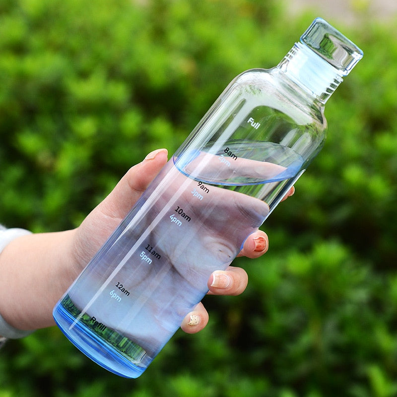 Bouteille d'eau en verre résistante à la chaleur avec échelle horaire