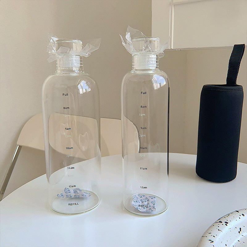 Bouteille d'eau en verre résistante à la chaleur avec échelle horaire