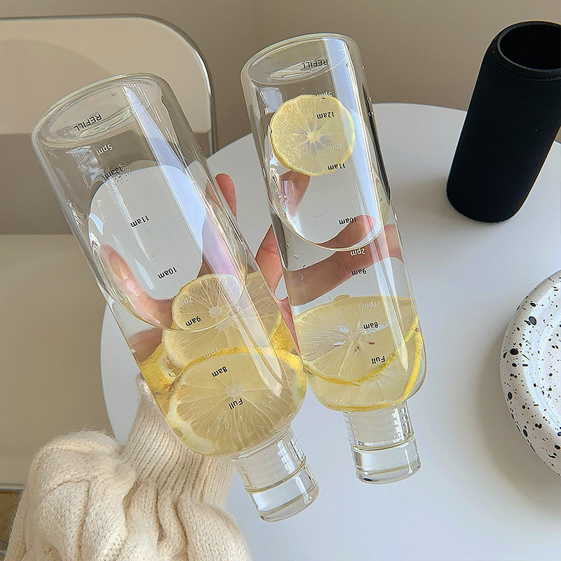 Bouteille d'eau en verre résistante à la chaleur avec échelle horaire
