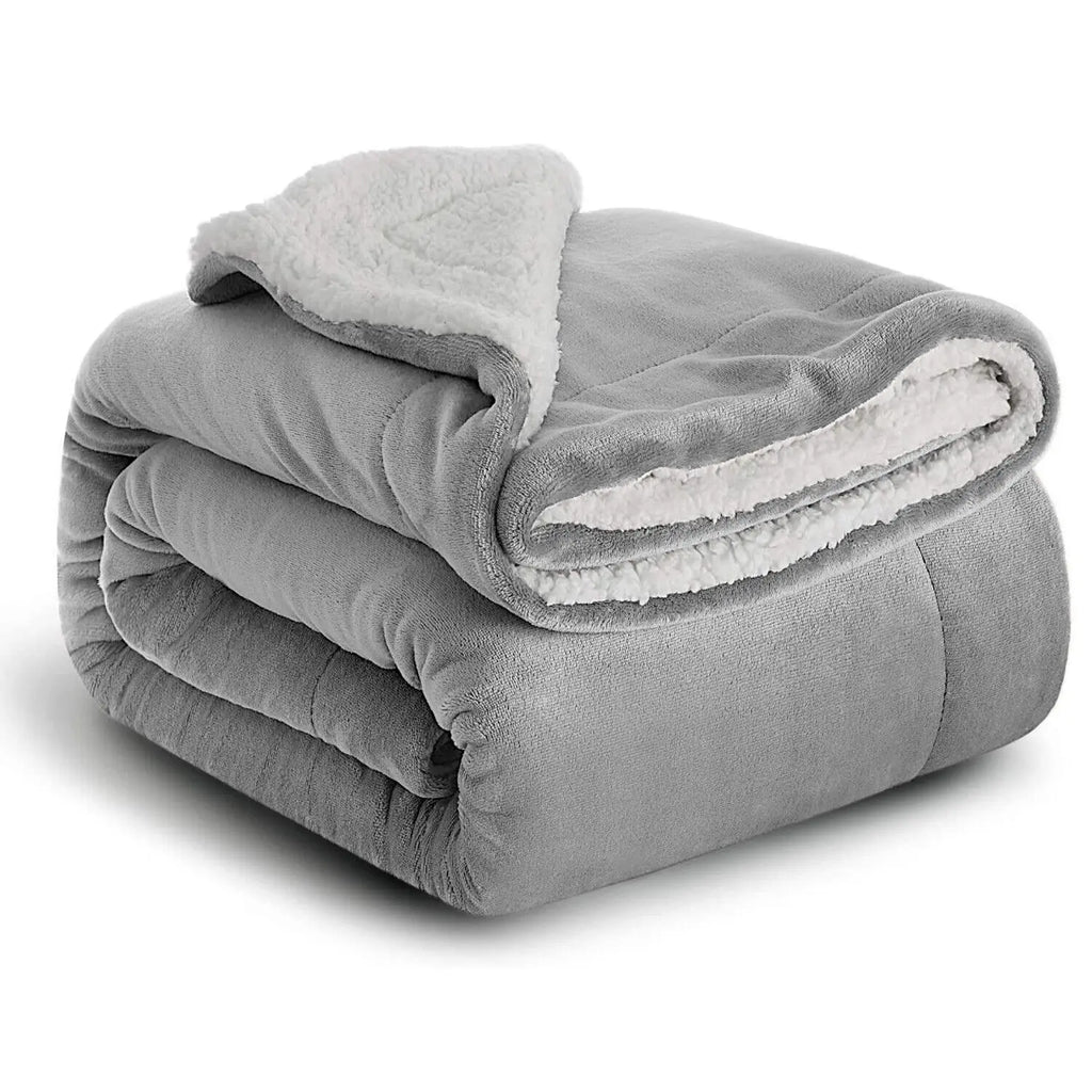 Couverture en sherpa réversible