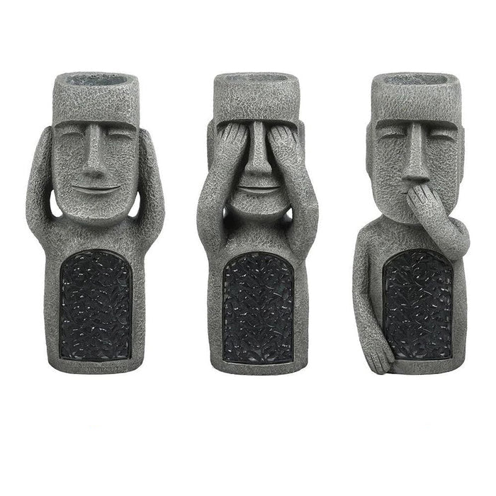 Pot de fleurs GlowPot visage sculpté