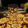 Lanterne solaire en métal avec motif floral
