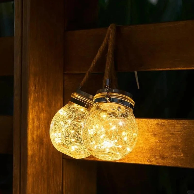 Lampe suspendue extérieure avec boule en verre et support en corde