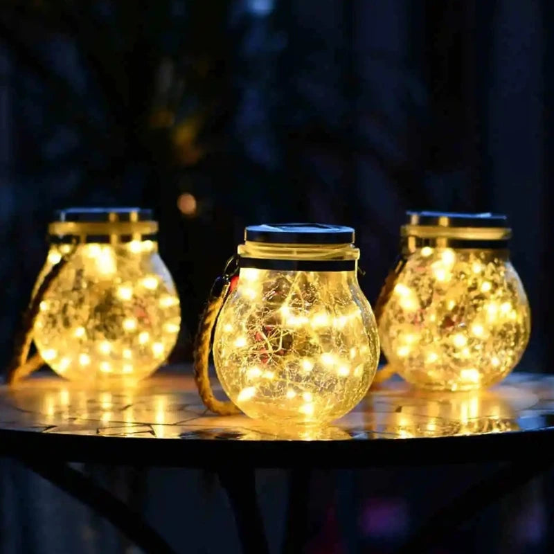 Lampe suspendue extérieure avec boule en verre et support en corde