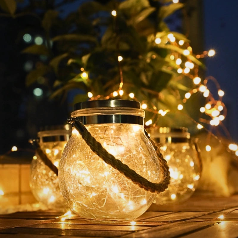 Lampe suspendue extérieure avec boule en verre et support en corde