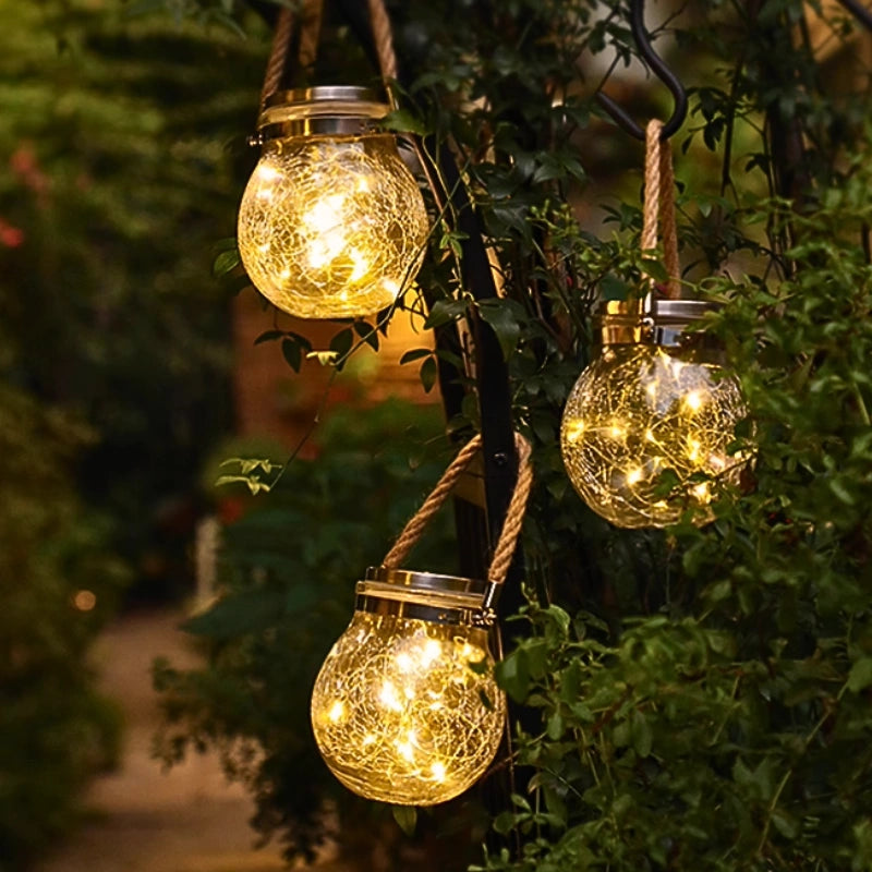 Lampe suspendue extérieure avec boule en verre et support en corde