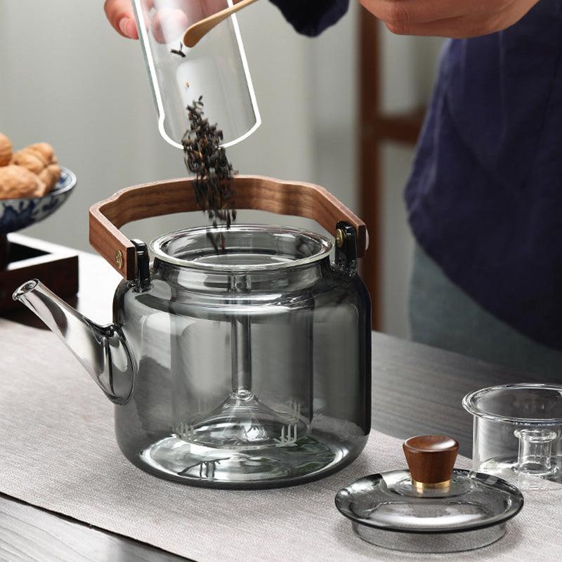 Théière en verre avec couvercle en bois et filtre – 1,2 litre, verre fumé et bois pour une expérience de dégustation de thé élégante
