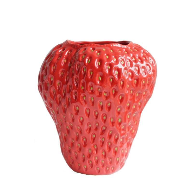 Vase en céramique en forme de fraise avec finition texturée