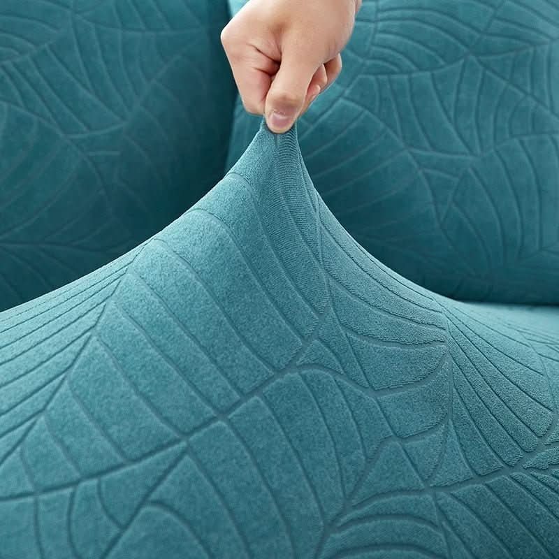 Housse de canapé extensible – Élégance naturelle et protection garantie