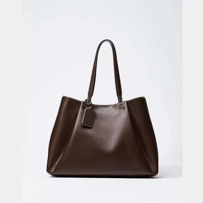 Sac à main de luxe pour femme, design élégant avec poignée supérieure et clip