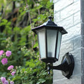 Lampe murale extérieure traditionnelle avec détecteur de mouvement en finition noire