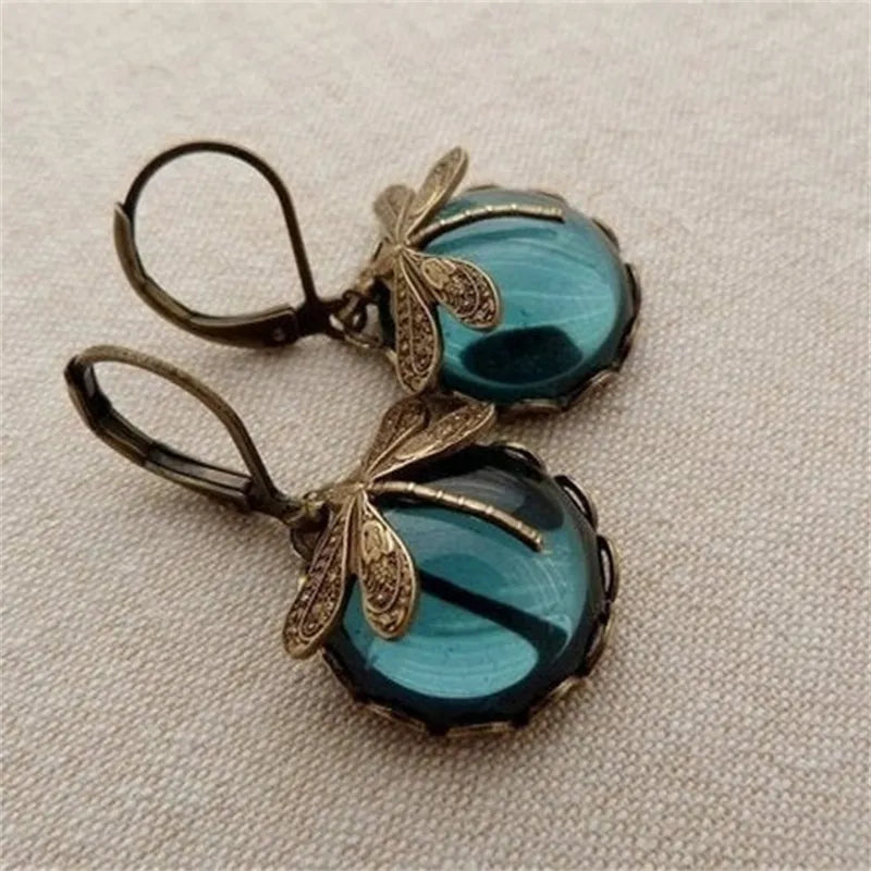 Boucles d'oreilles pendantes en pierre de lune libellule élégante