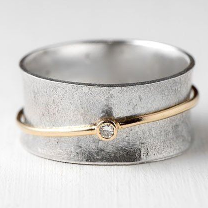 Bague vintage en argent avec des lignes dorées et des zirconiums - Aurina
